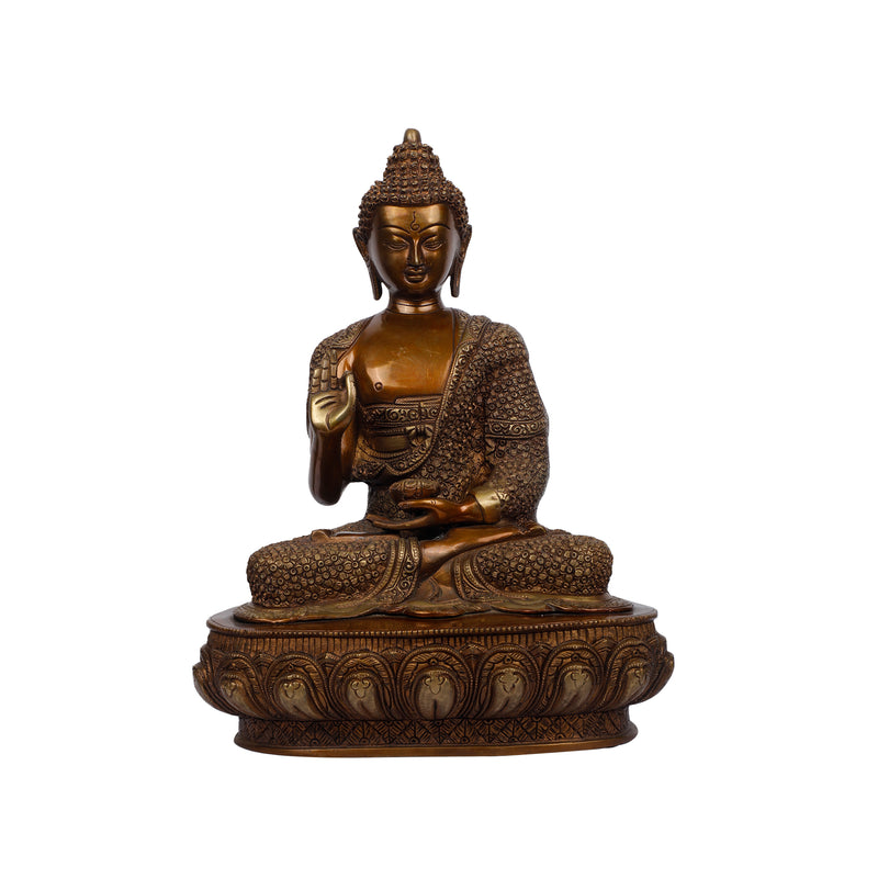 Brass Buddha sitting on base