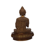 Brass Buddha sitting on base